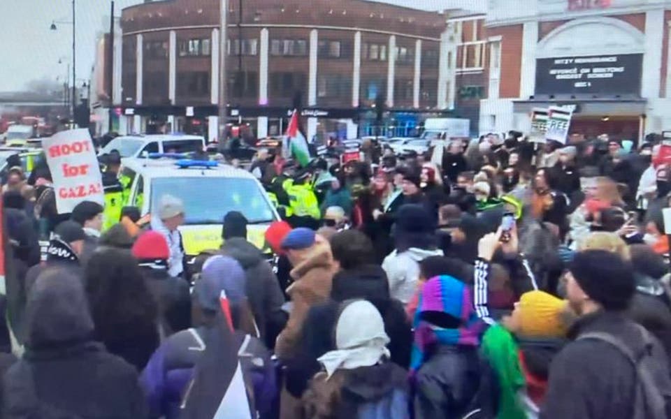 Two arrests as pro-Palestine activists block police van in Brixton 